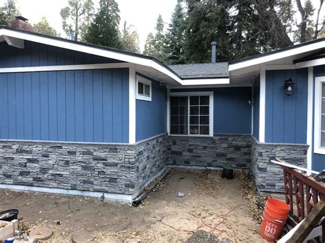 houses with vinyl siding and metal wainscoting|exterior wainscot.